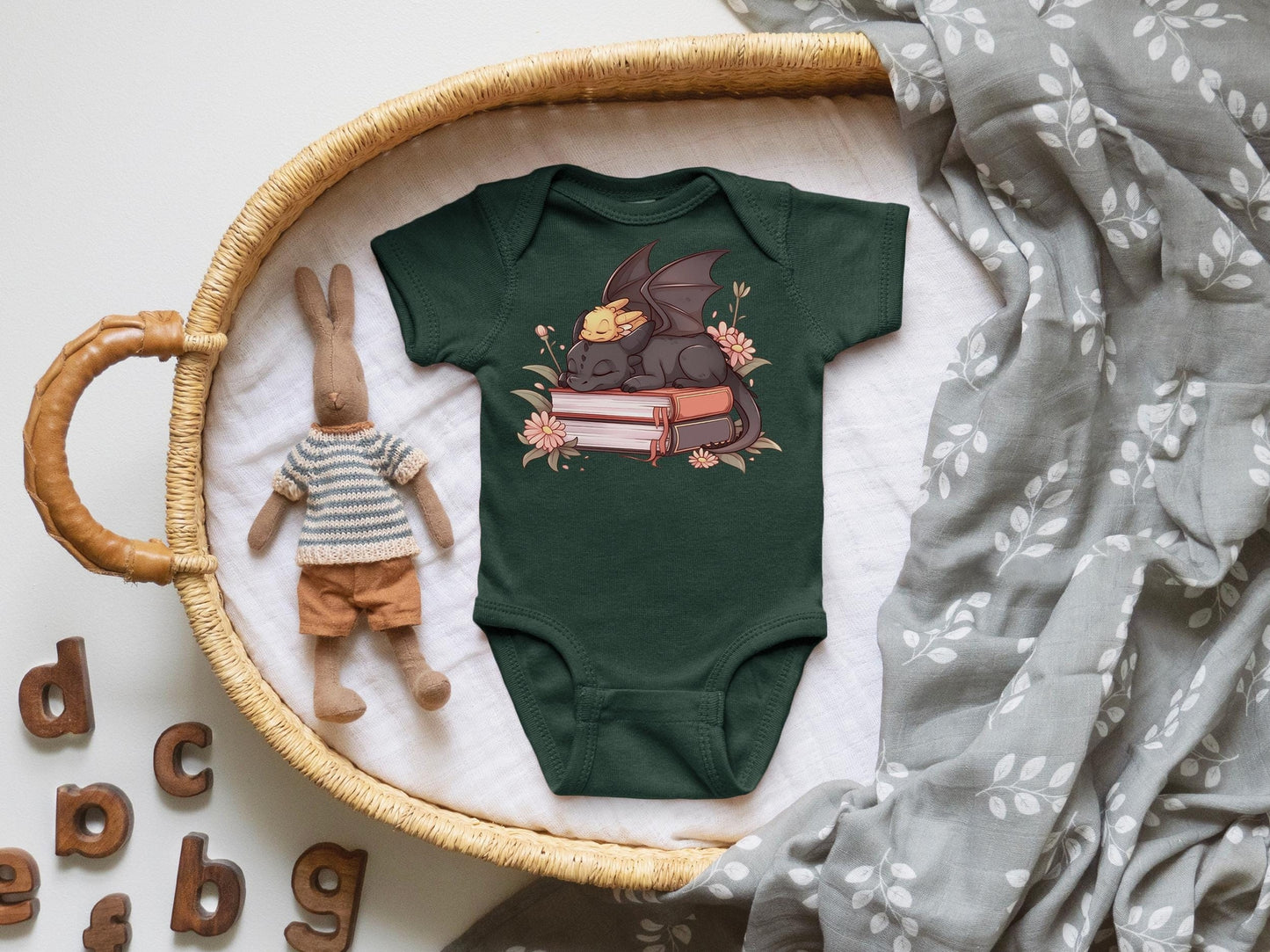 BABY DRAGON READING ONESIE