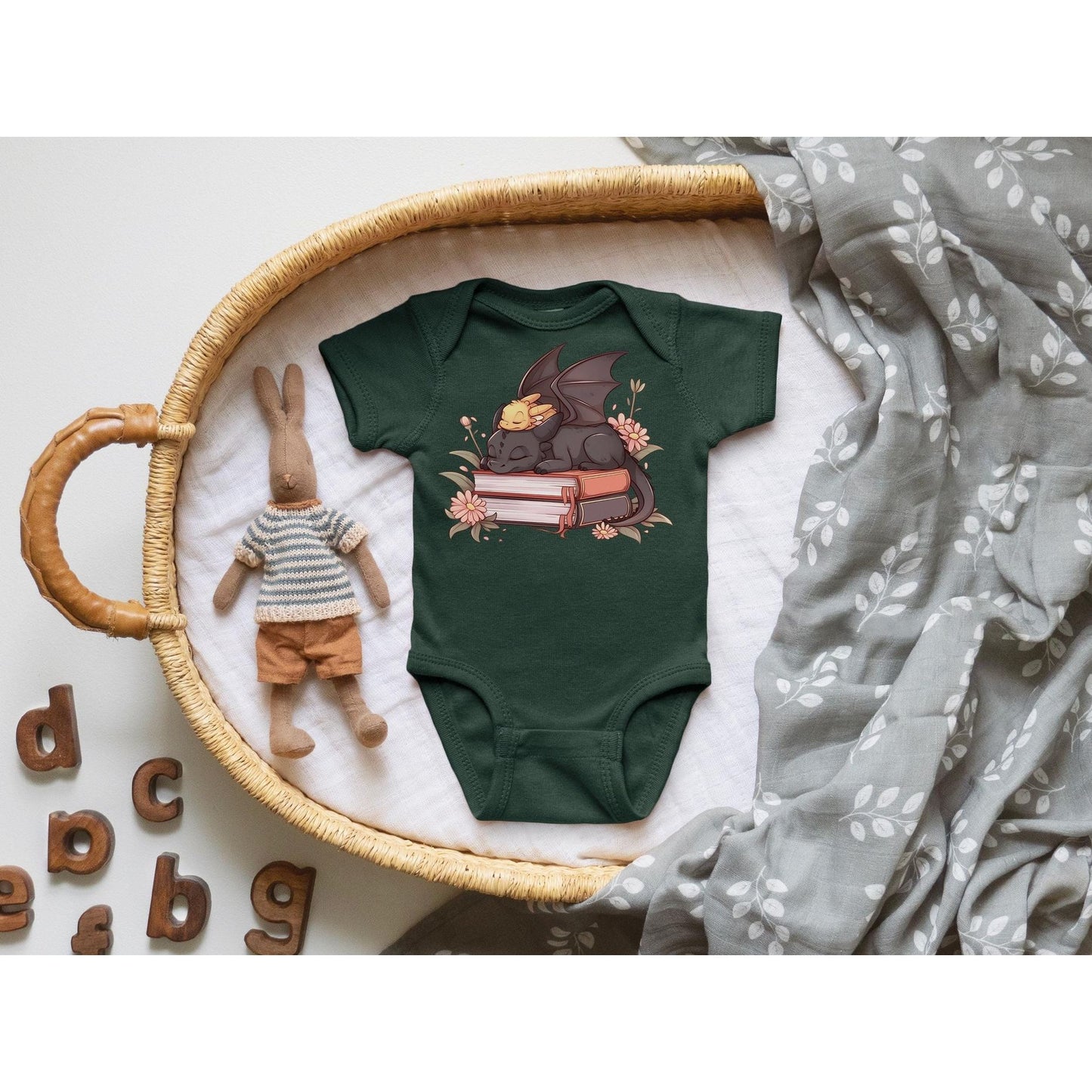 BABY DRAGON READING ONESIE