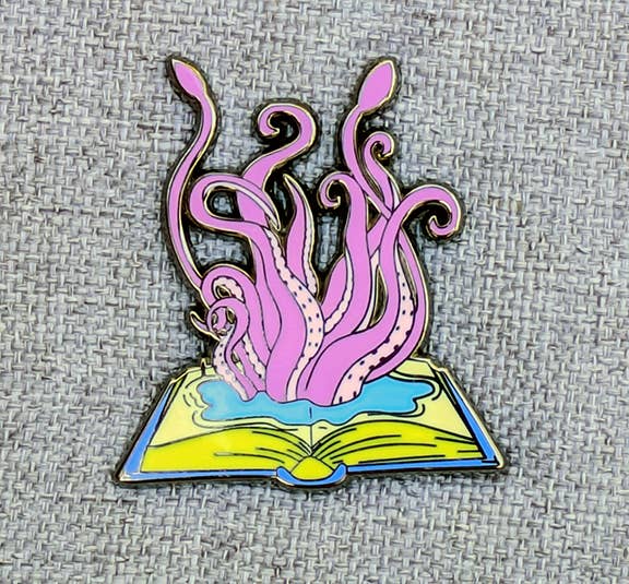 KRAKEN ESCAPING FROM BOOK ENAMEL PIN