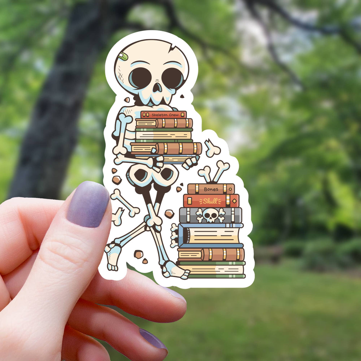 SKELETON CARRYING BOOKS STICKER