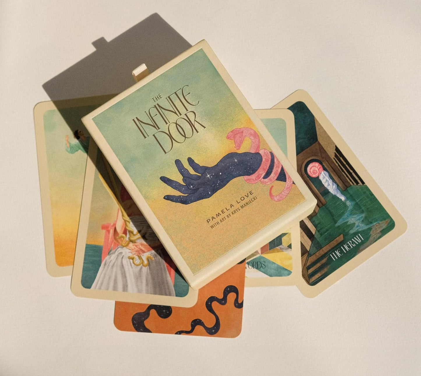 THE INFINITE DOOR: A TAROT DECK AND GUIDEBOOK BY PAMELA LOVE AND KRYS MANIECKI