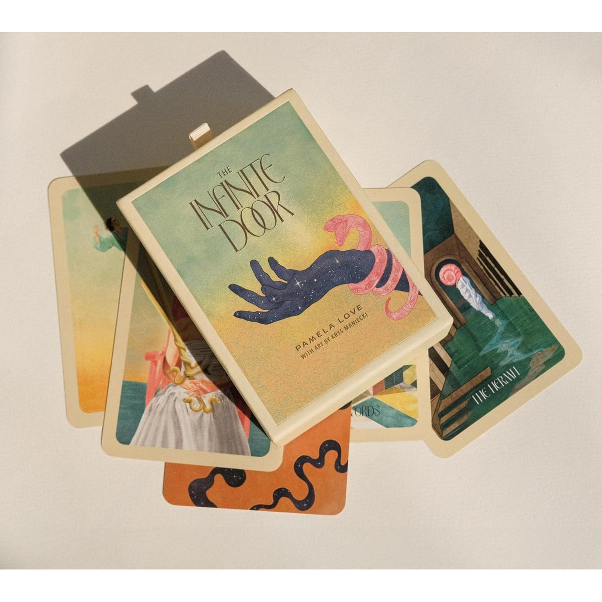 THE INFINITE DOOR: A TAROT DECK AND GUIDEBOOK BY PAMELA LOVE AND KRYS MANIECKI