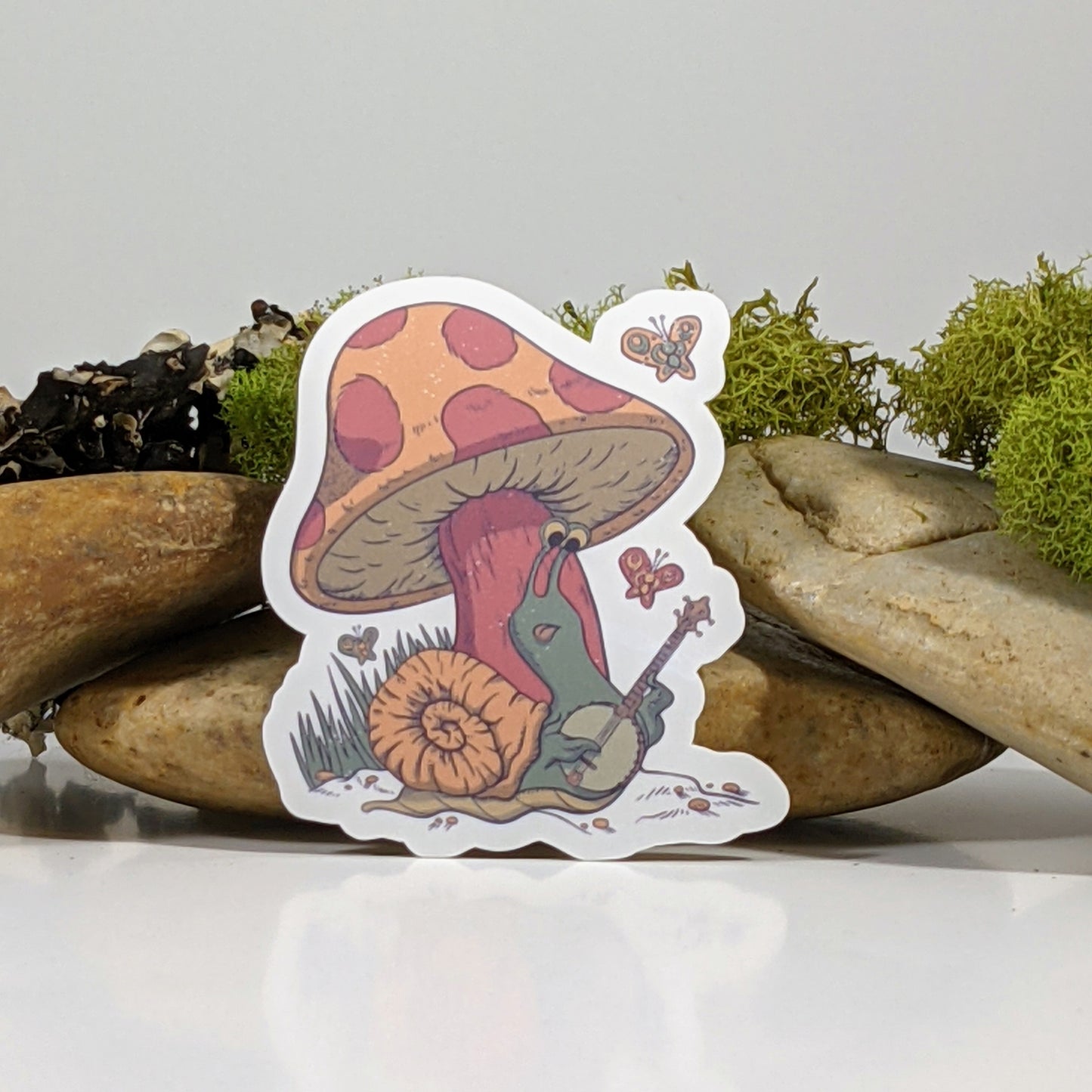 SNAIL PLAYING BANJO STICKER