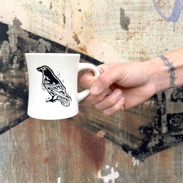 EMBOSSED CROW MUG