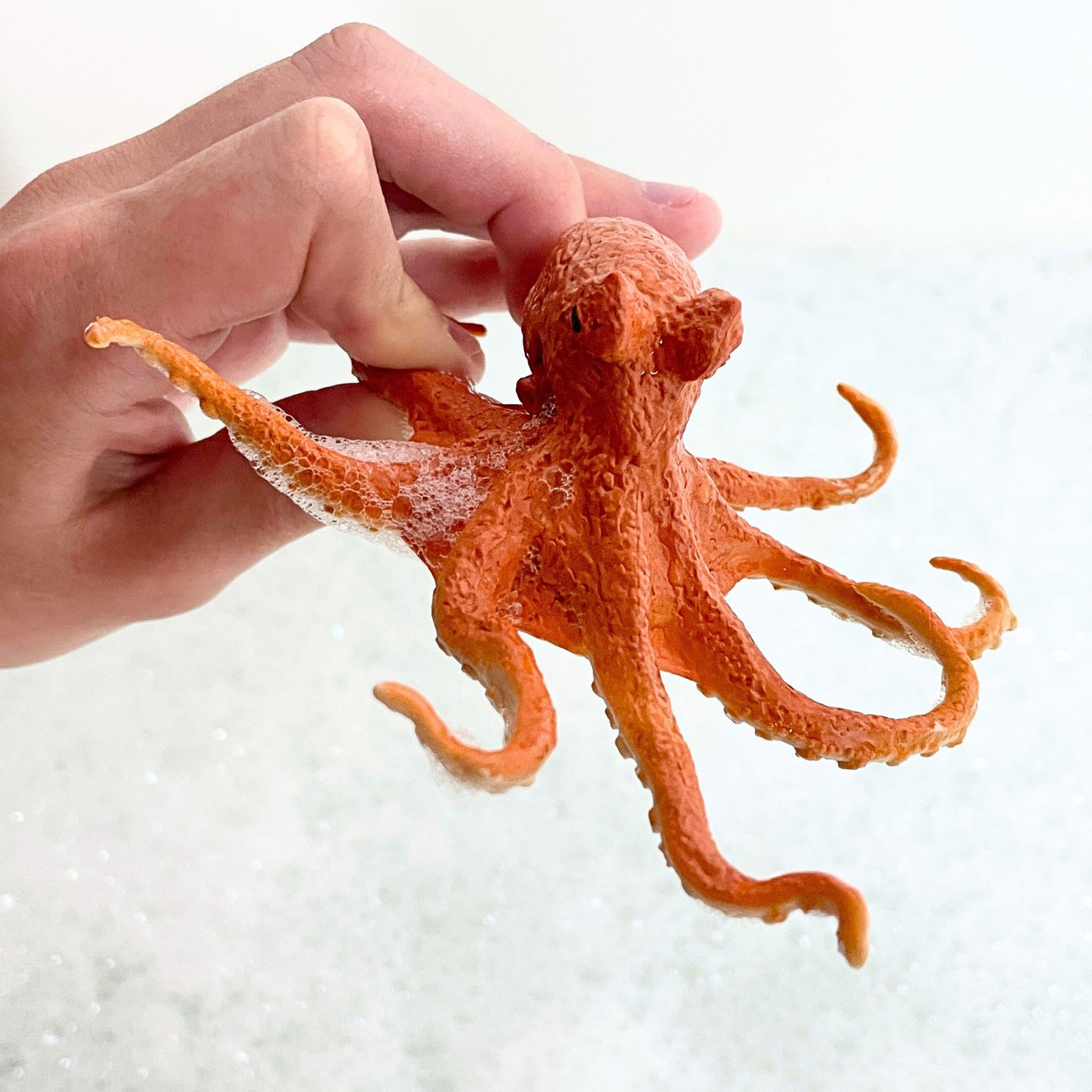 ORANGE OCTOPUS FIGURINE