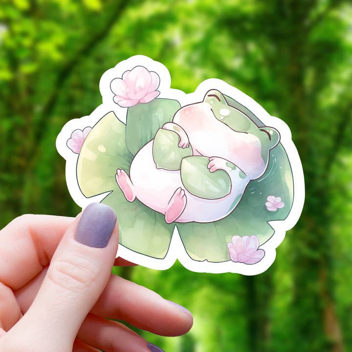 CHIBI FROG SLEEPING ON A LILYPAD STICKER