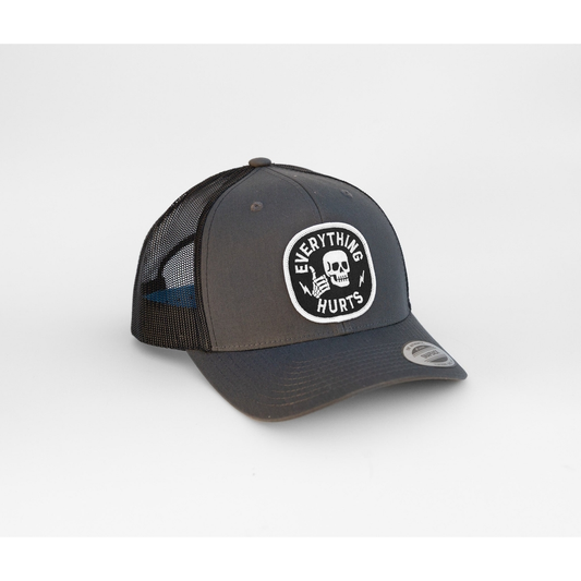 EVERYTHING HURTS VINTAGE TRUCKER HAT