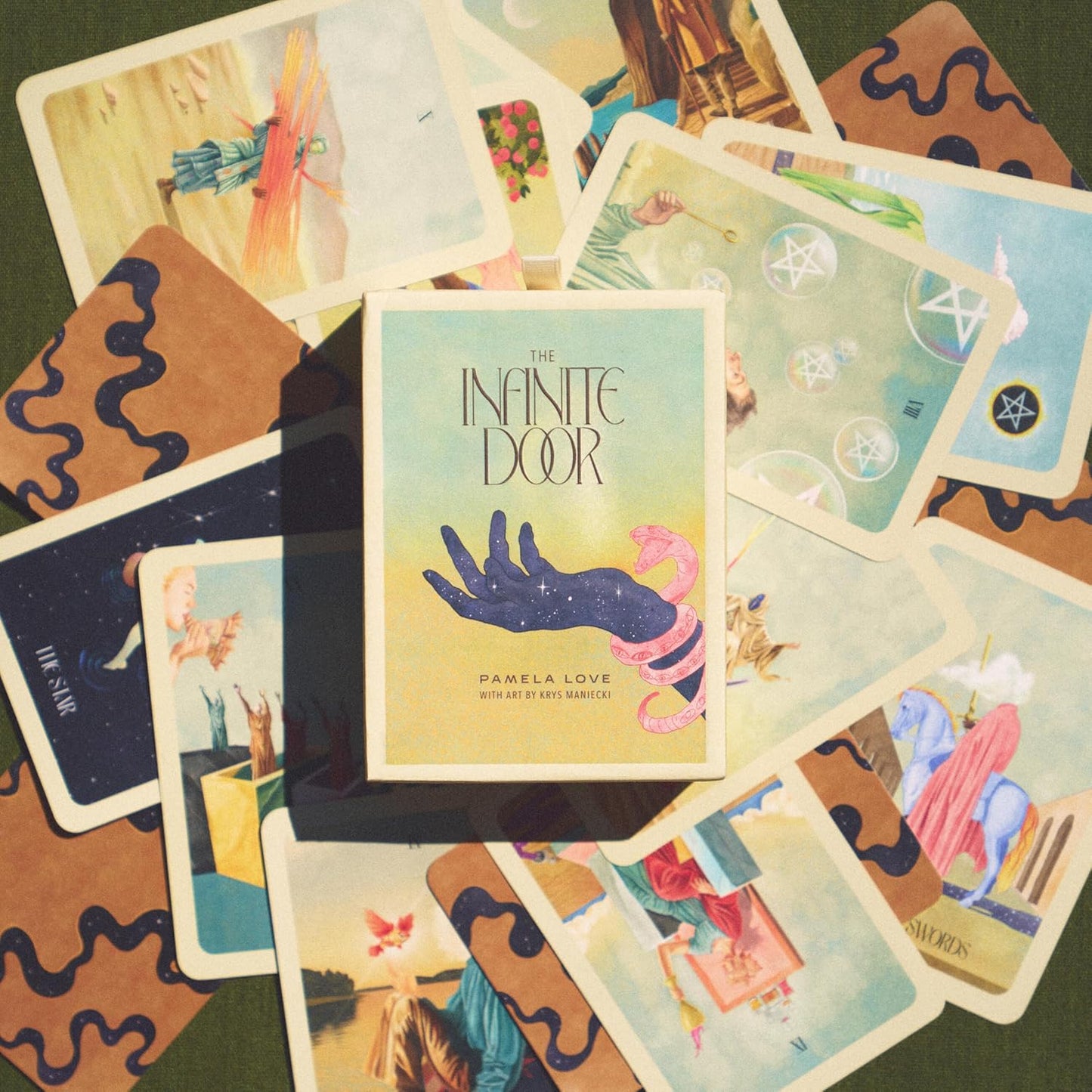 THE INFINITE DOOR: A TAROT DECK AND GUIDEBOOK BY PAMELA LOVE AND KRYS MANIECKI