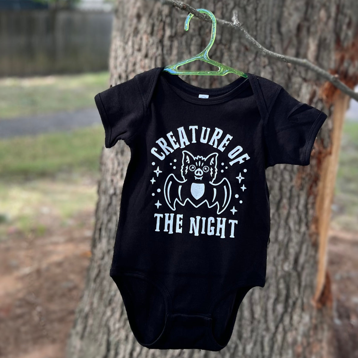 CREATURE OF THE NIGHT BABY ONESIE
