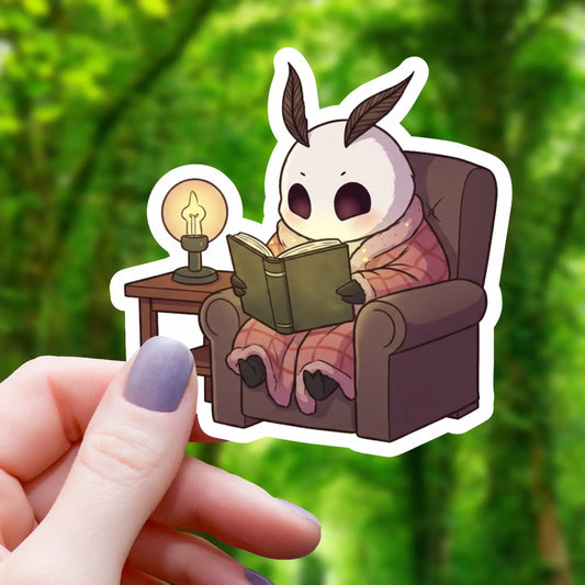 MOTHMAN READING IN RECLINER STICKER