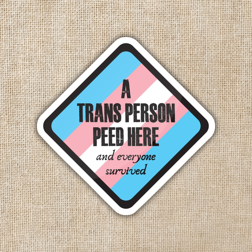 A TRANS PERSON PEED HERE STICKER