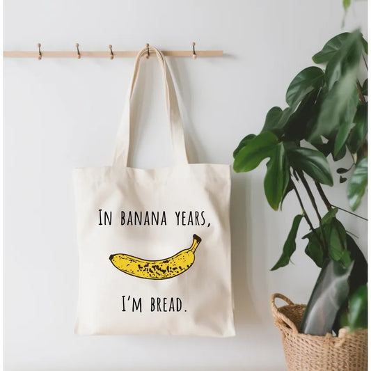IN BANANA YEARS, I'M BREAD TOTE BAG